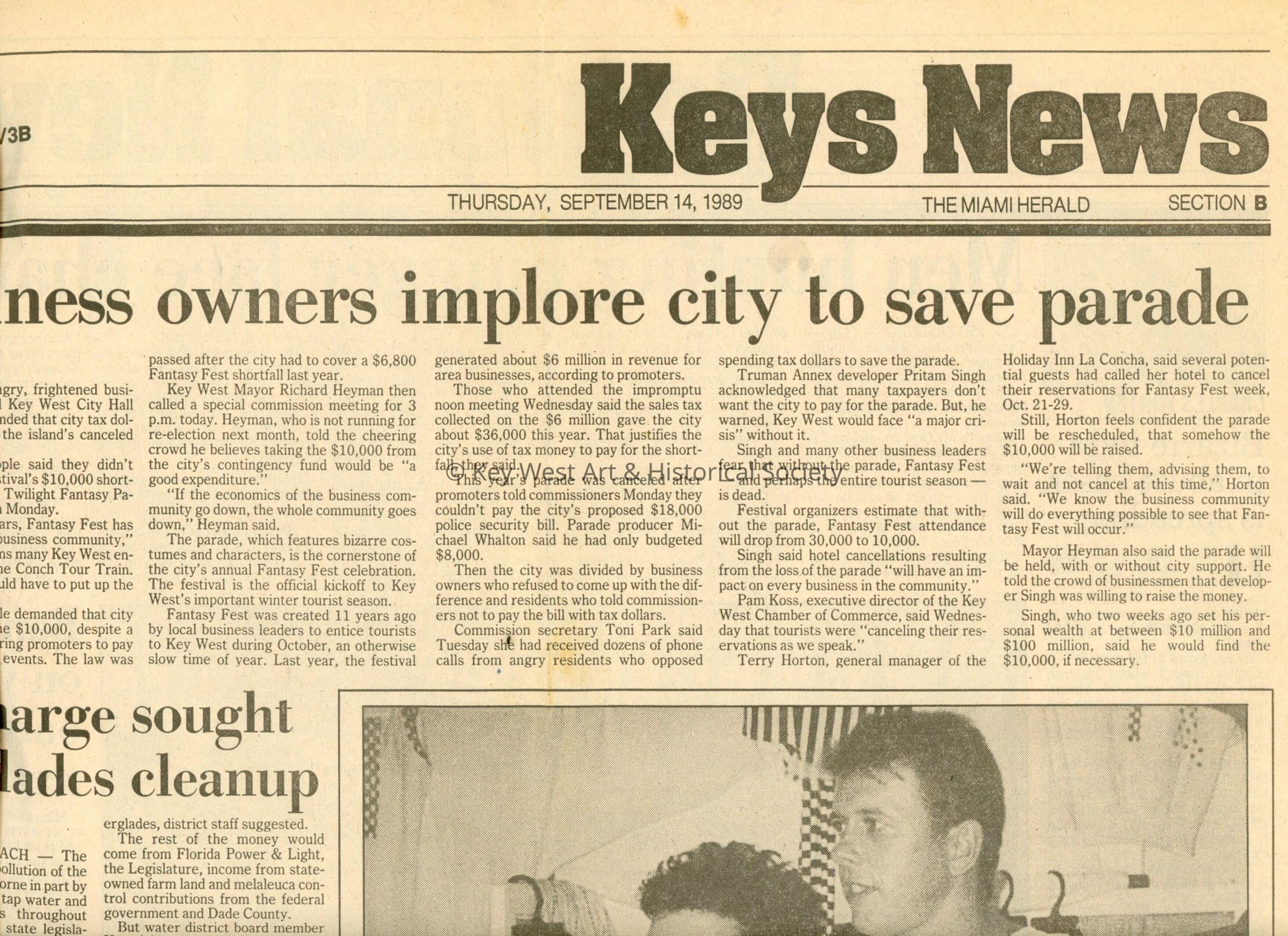 An article in the Miami Herald that reads Business owners implore city to save parade. picture number 1