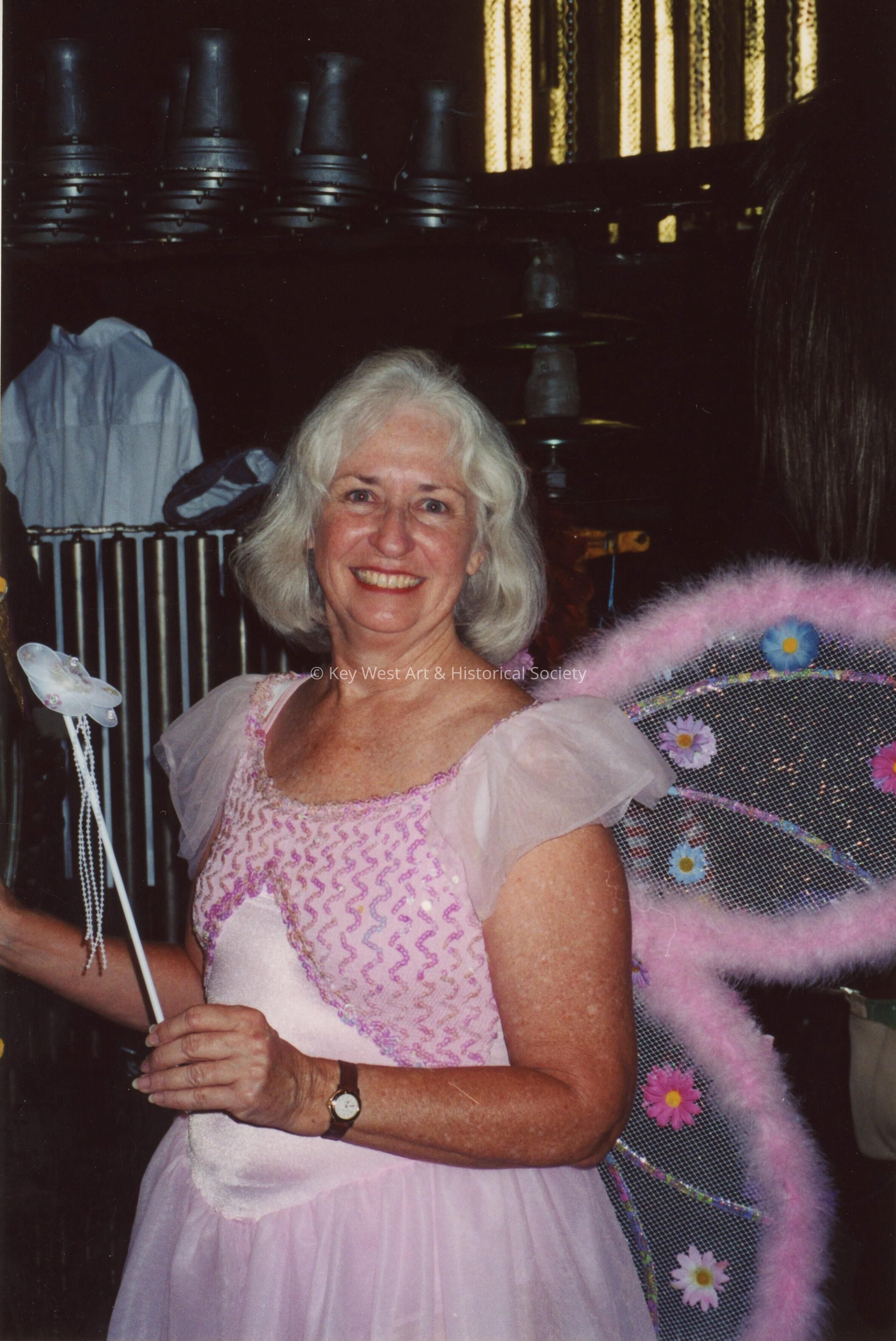 An unknown lady dressed up.