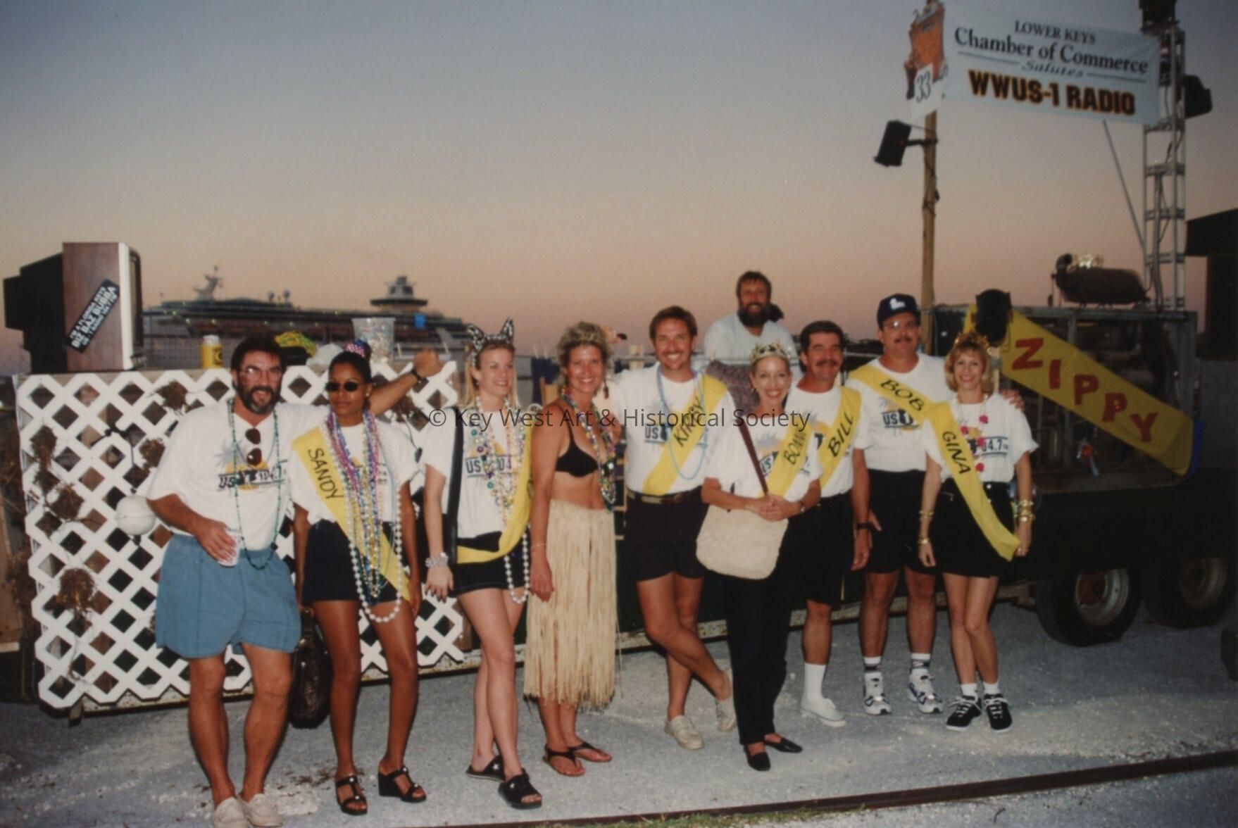 An unknown group of people standing in front of float number 33.