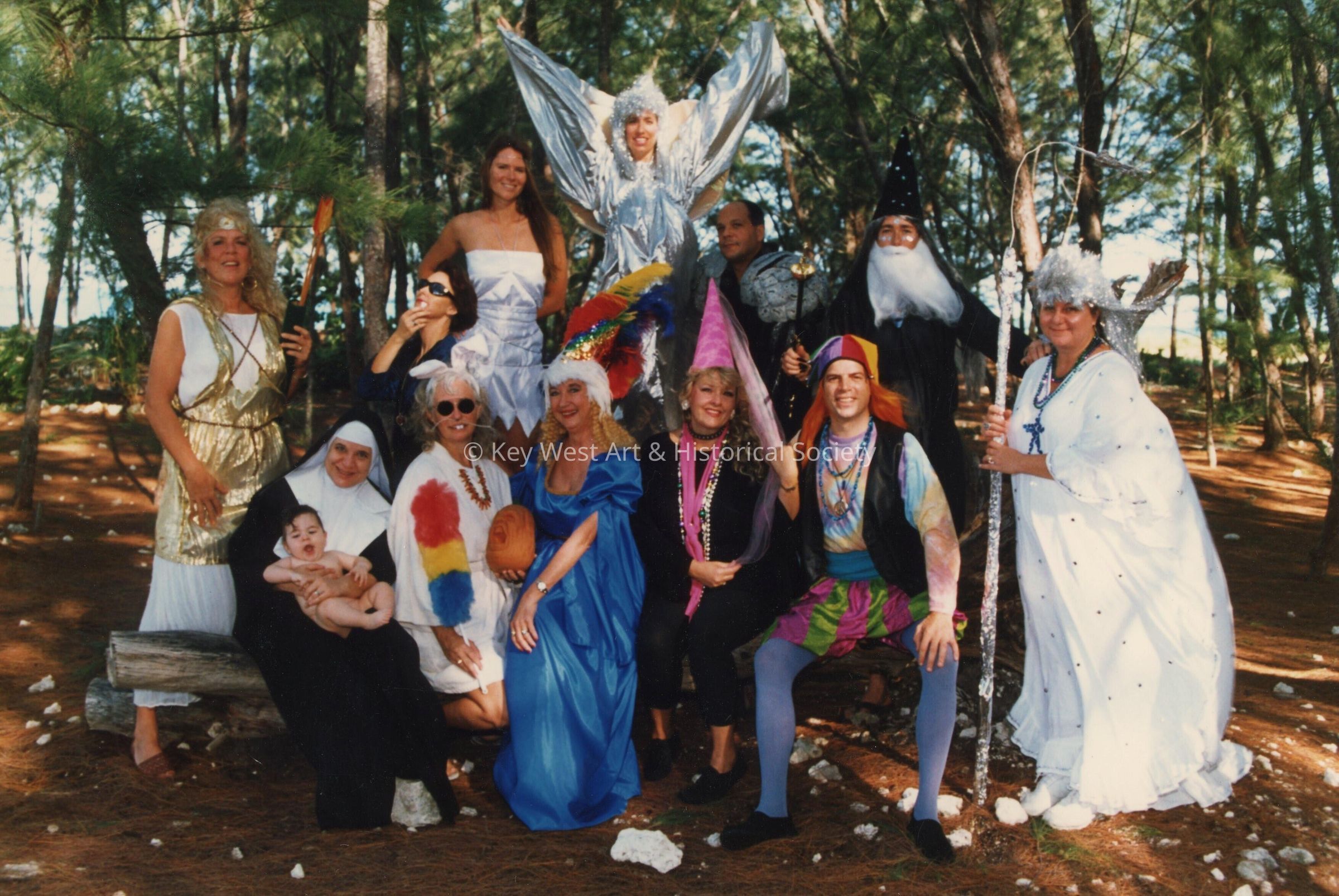 A group of unknown people dressed up.
