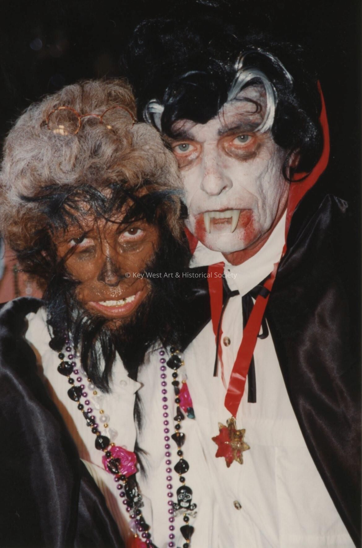 An unknown couple dressed up.