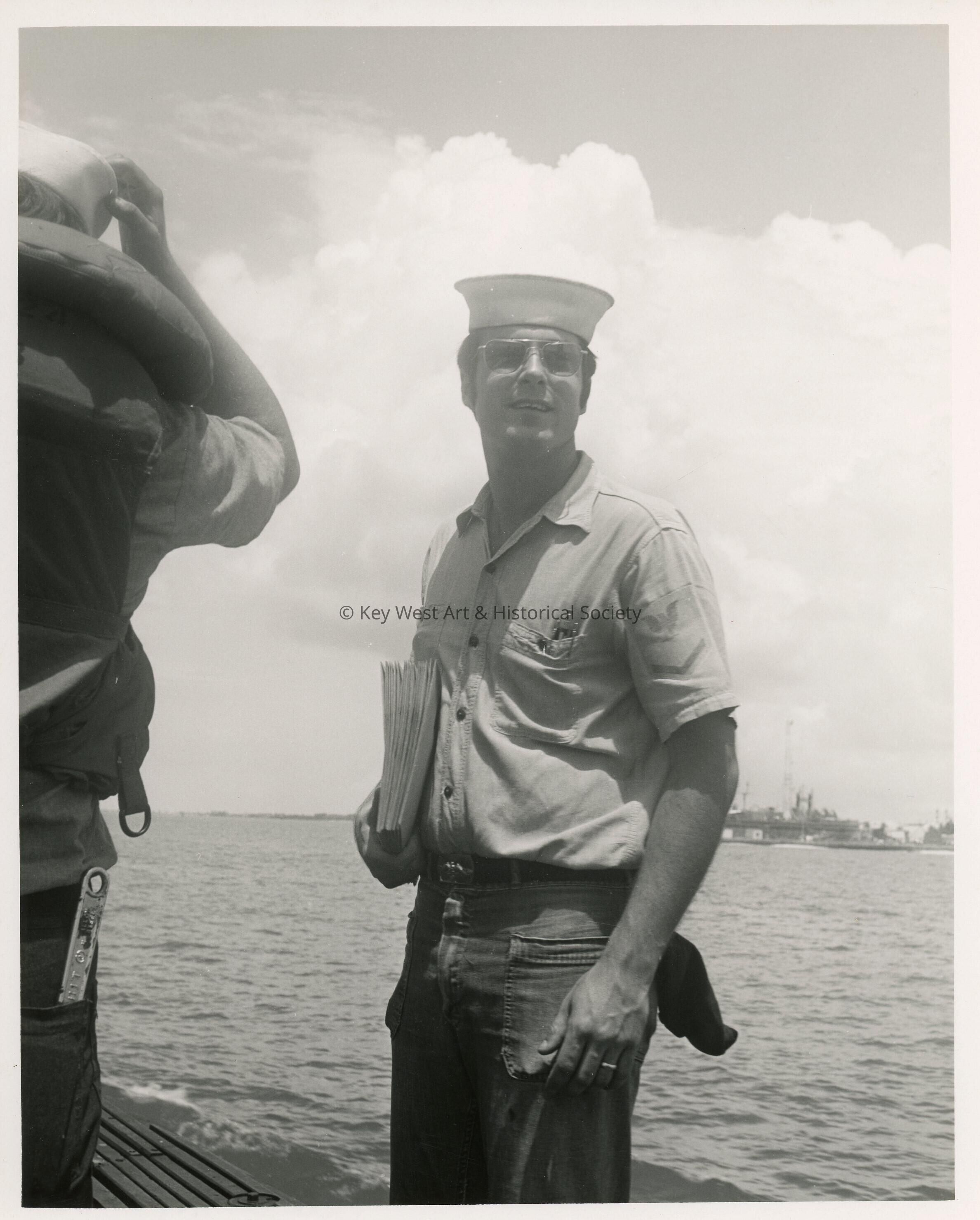An unknown man in uniform on a ship