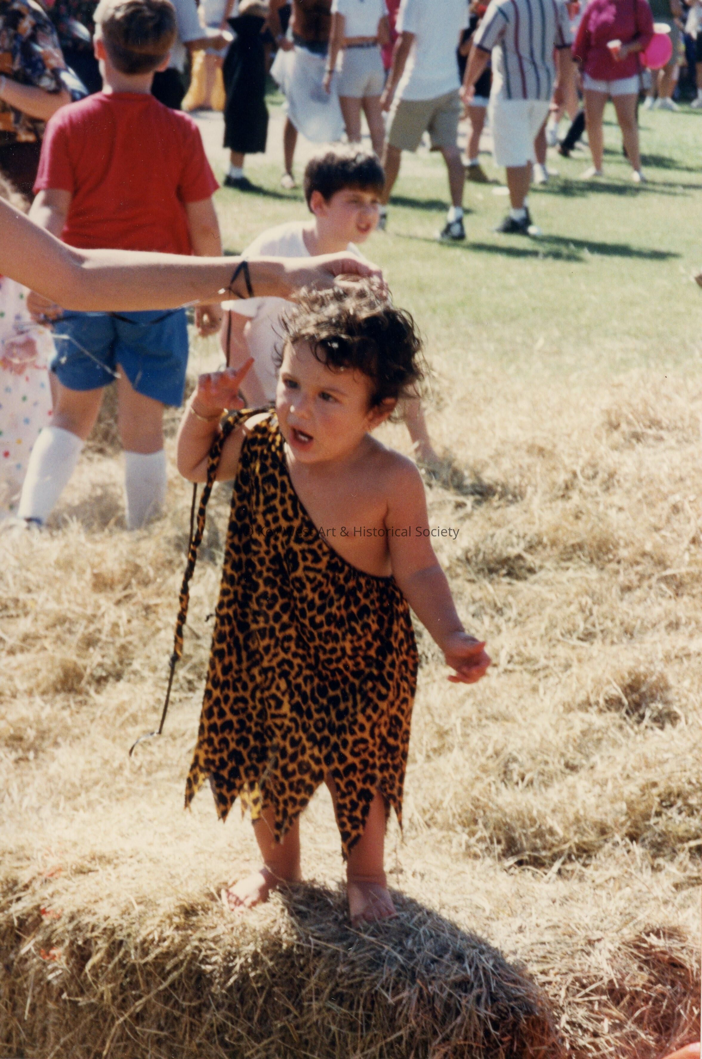 An unknown child dressed up at children's day.