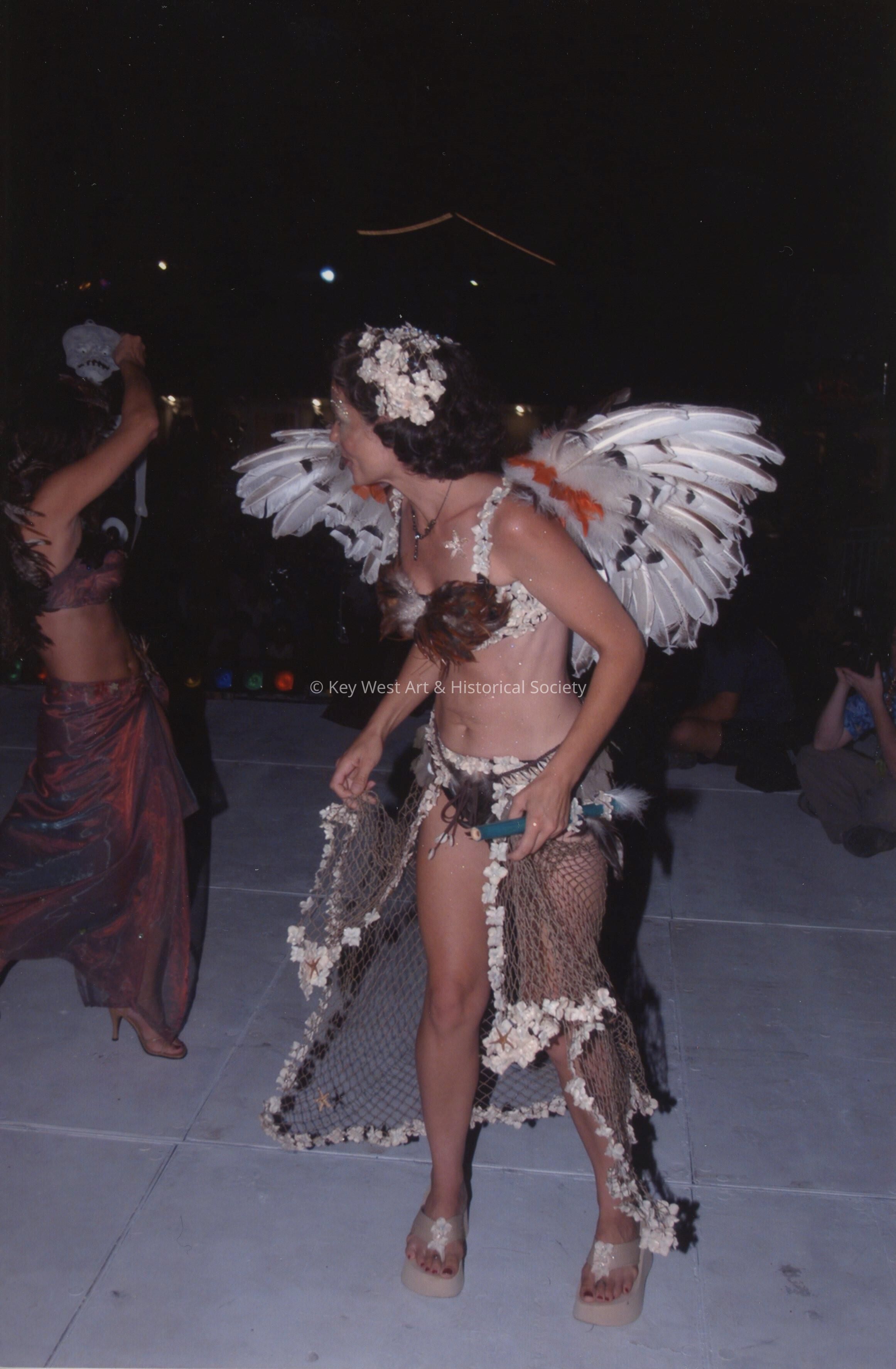 An unknown woman dressed up.