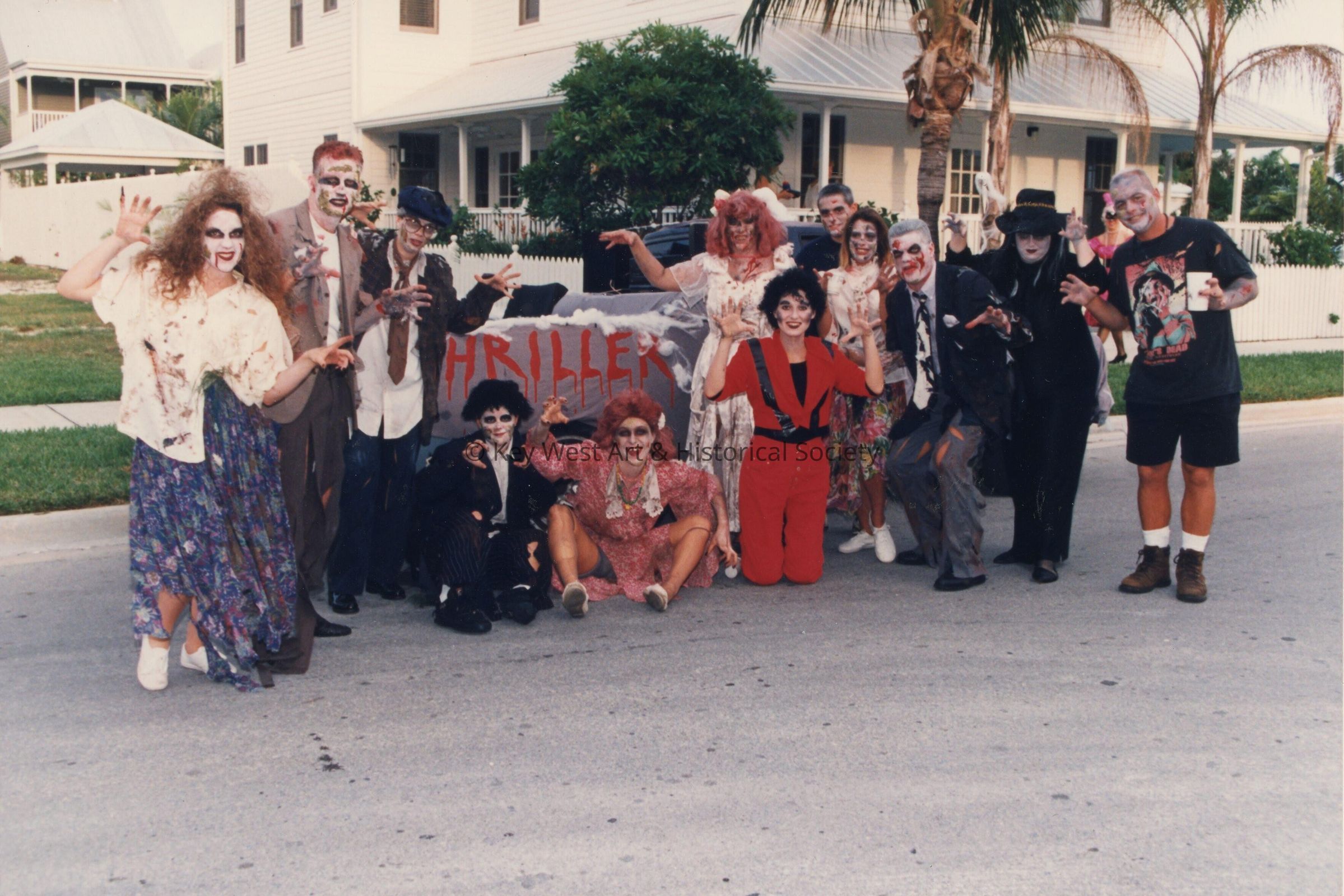 A group of unknown people dressed up.