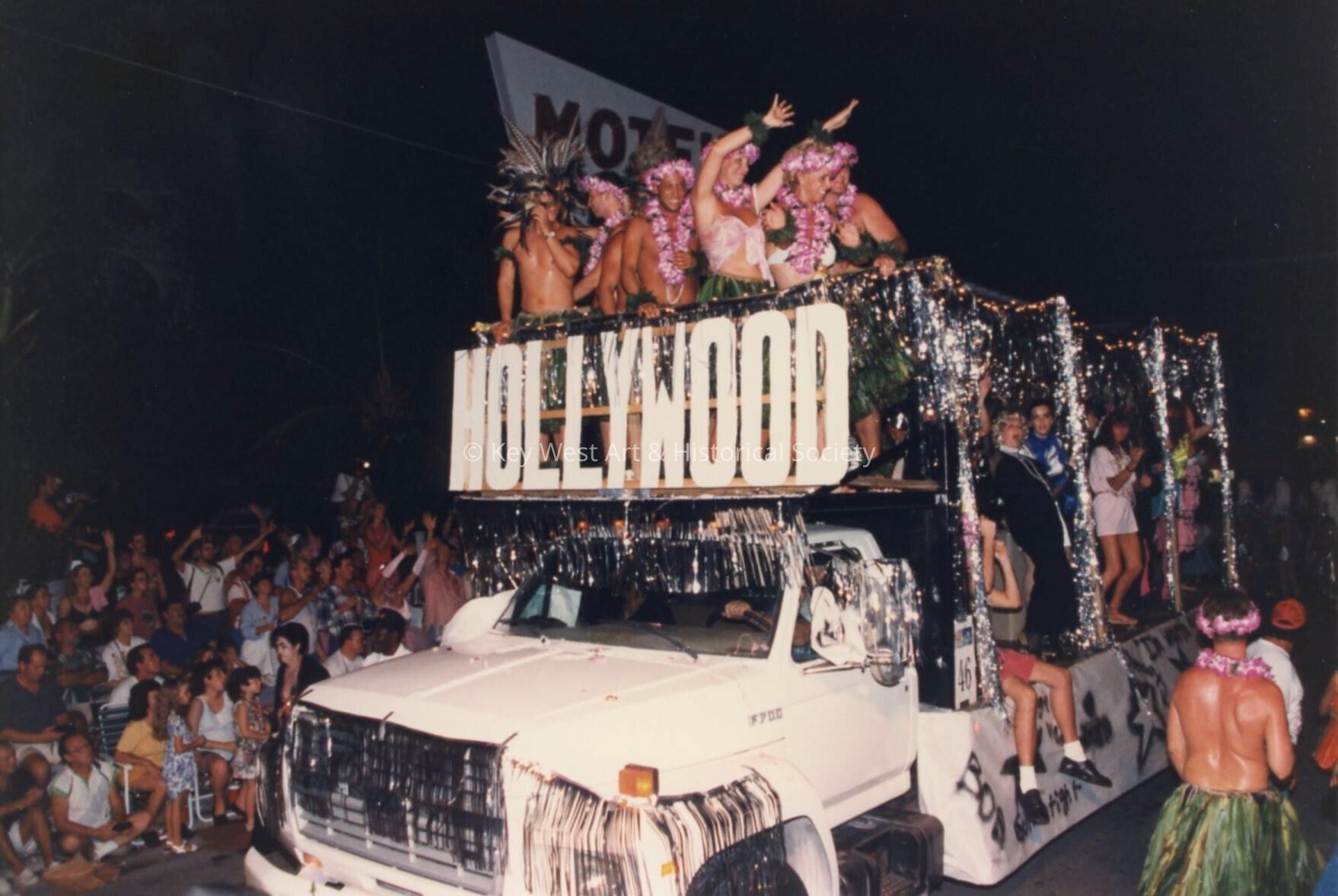 A float in the parade that reads Hollywood on the front.