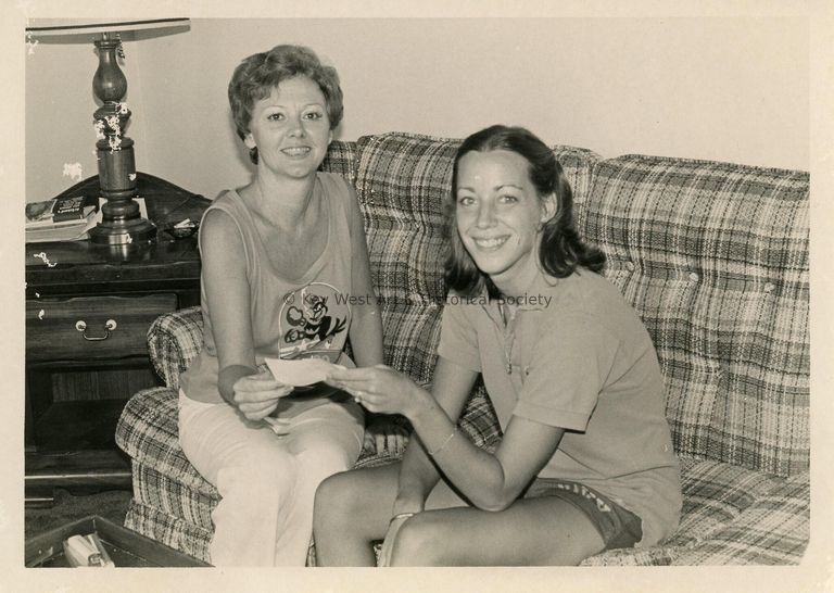 2 Unknown woman on a couch