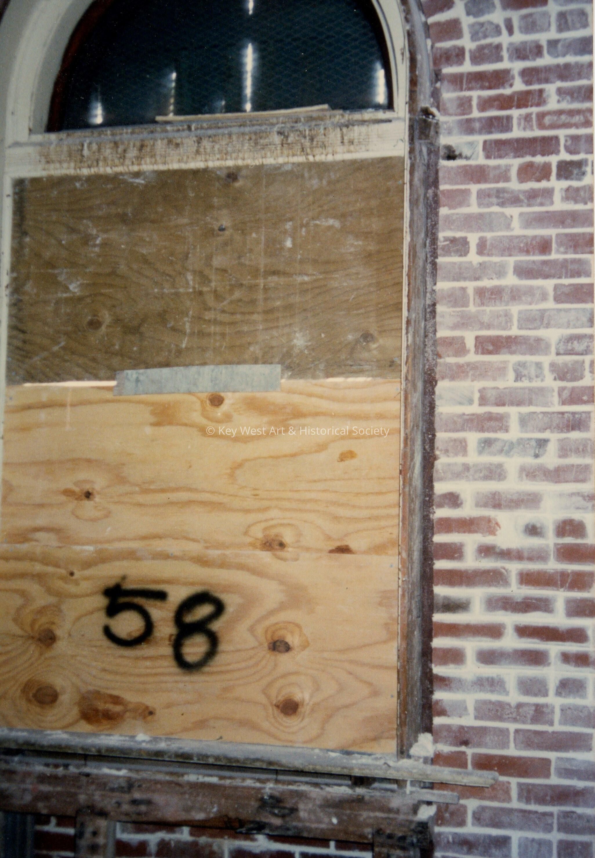 A window labeled with the number 58.