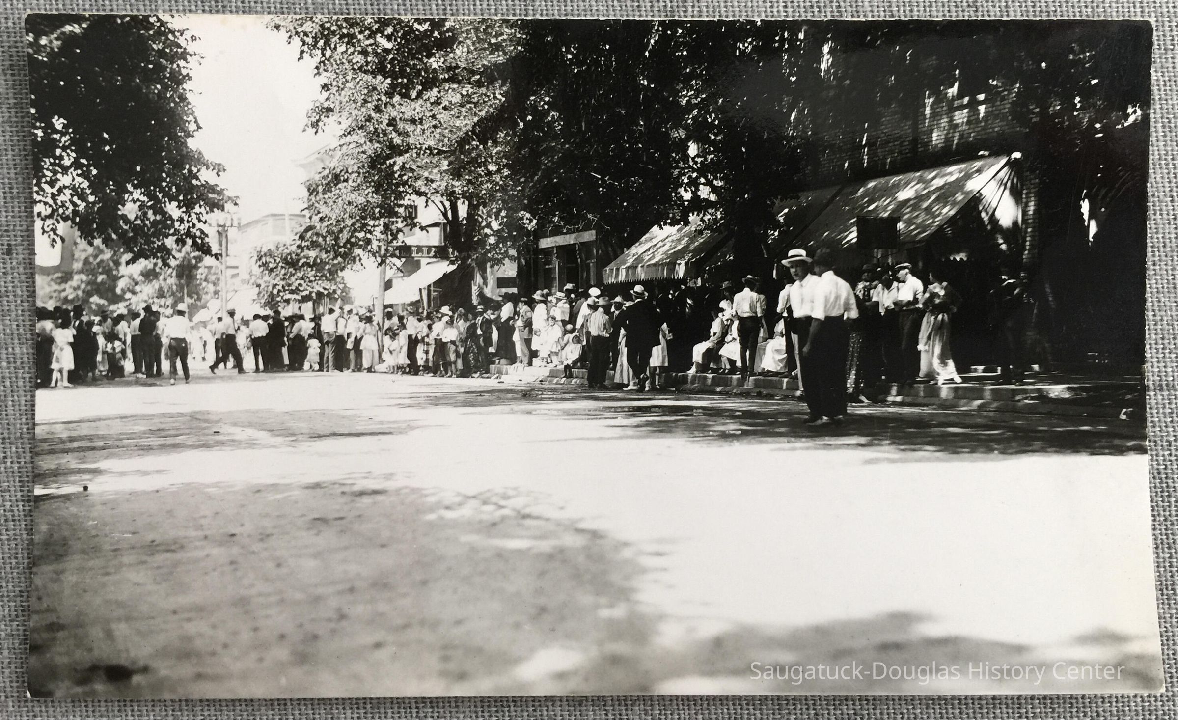 Crowds gather along the street picture number 1