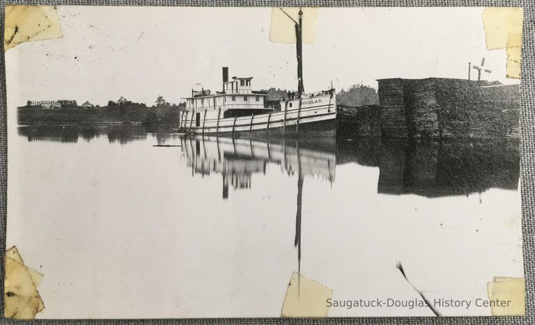          Steamer Douglas docked by stacks of lumber picture number 1
   