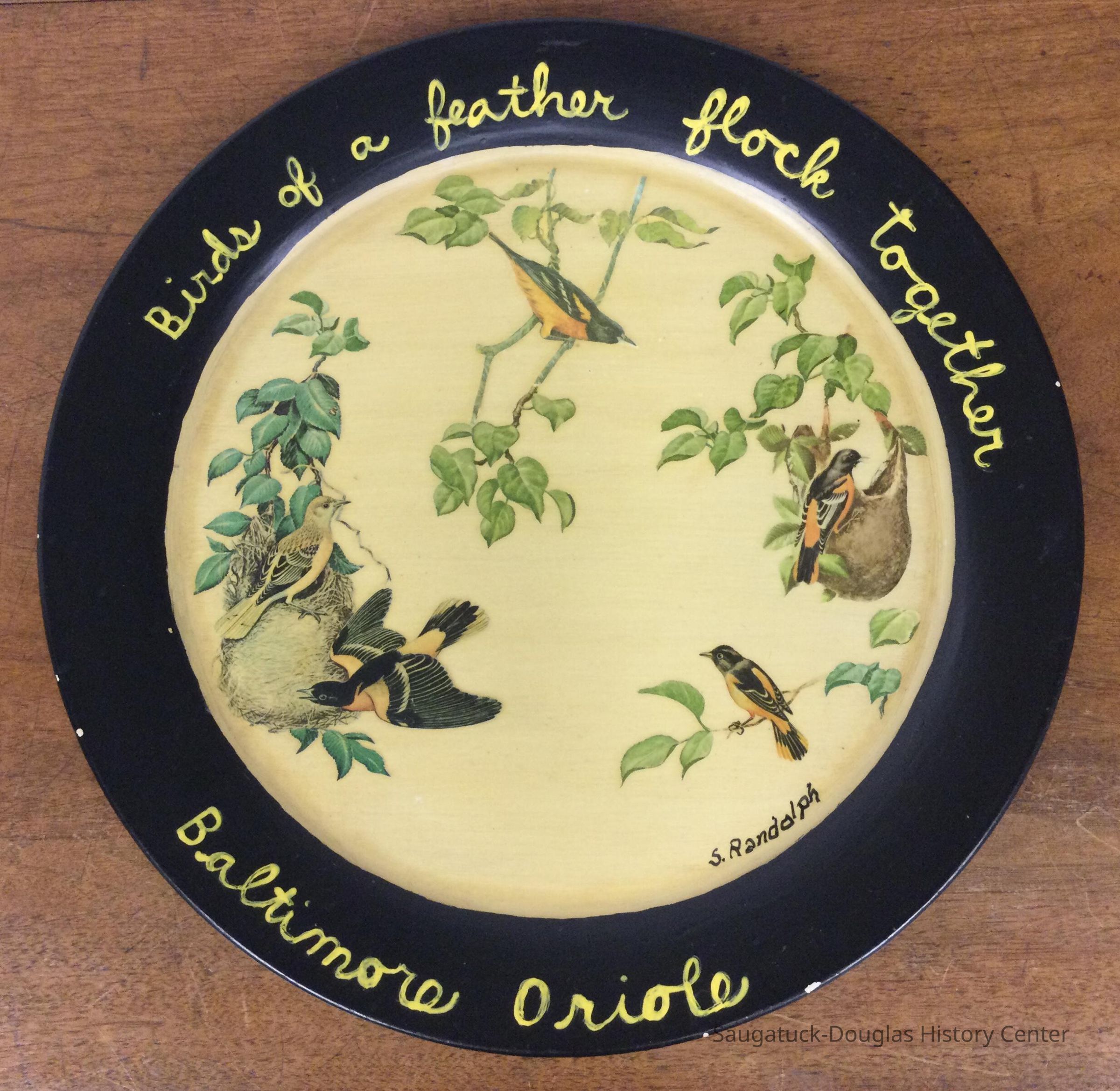 Tray reads: “Birds of a feather flock together, Baltimore Oriole”