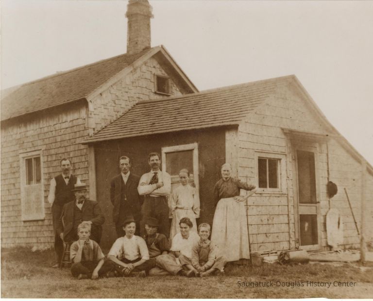          ER-AugustEricksonFamily-0001.JPG 481KB; The attached Photo shows the Gibson homestead (circa 1903), family, and several relatives. August & Ida stand in front of the window beside August's sister Sophia. Ida's brother-in-law Claus Wahlen stands at the extreme left of the photo. Children seated from left are David, Ida's nephew Carl Whalen, George, Anna and Charles. The remaining two men are unidentified (cousins?).--photo provided by Bob Erickson, April 2009
   