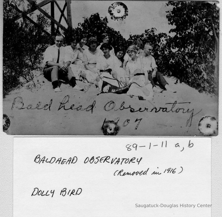          89-1-11 a baldhead.jpg 478; Bald Head Observatory 1907 Dolly Bird. Group of people sit on the sand at the base of the observatory.
   