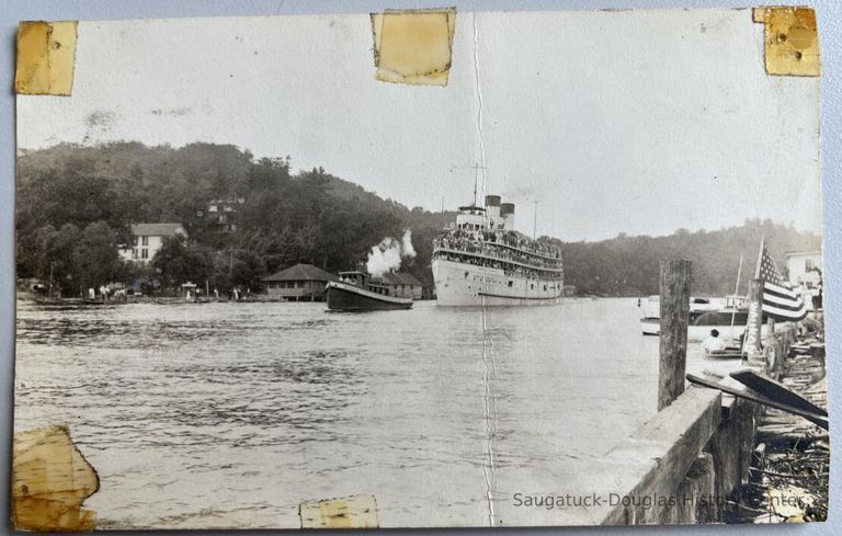          Tug towing loaded steamship picture number 1
   