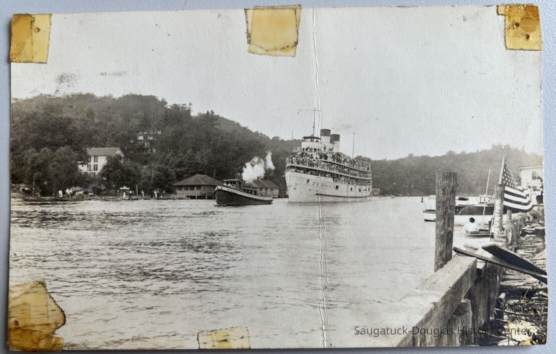 Tug towing loaded steamship picture number 1