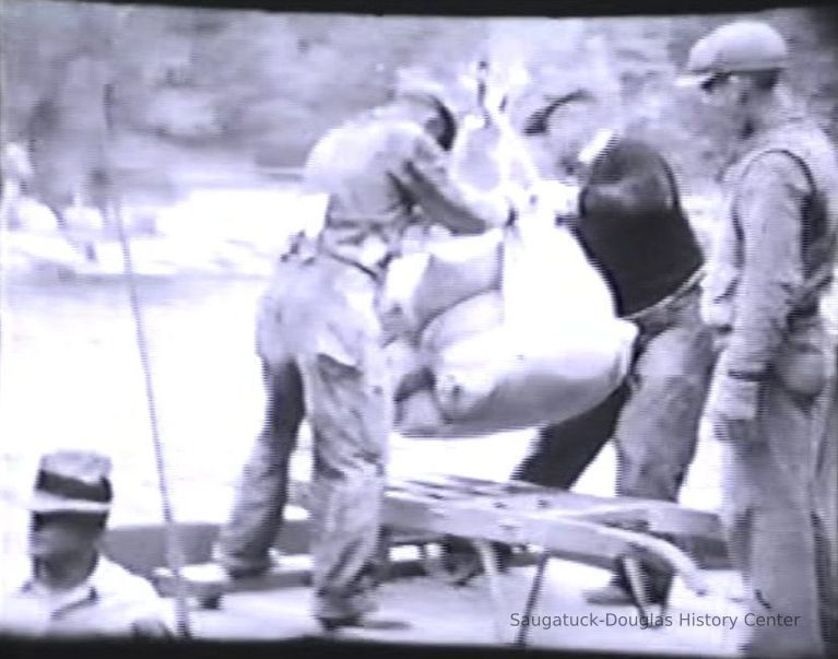          screenshot from the DVD; hauling in cement
   