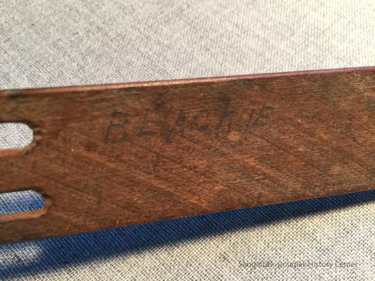 "Blackie" is written in pencil on one side