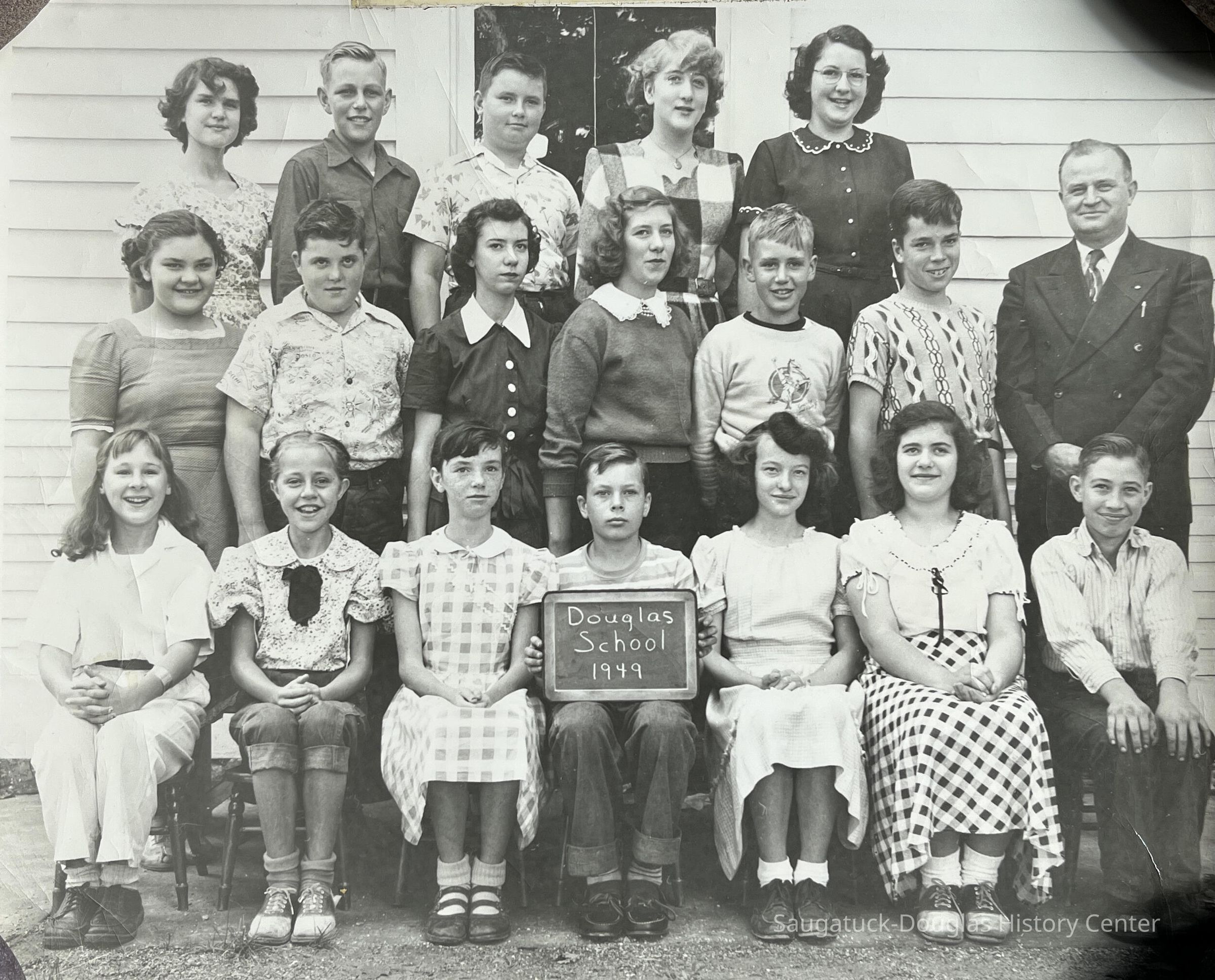 1949; BACK ROW - Jimmy Bruce, Bud Schreckengust, Maggie VanSyckel, Kay Schrenkengust Spencer
MIDDLE - Mary Ash, Earl Herring, Jean and Jane Norman, Harry Forrester, Kim Greene. Teacher Mr. Olmsted
FRONT - Patti Erlewein, Helen Mueller, Ruth Ann Troutman, Mike McVoy, Florence Gooding, Joan Norman, Glenn Gooding
