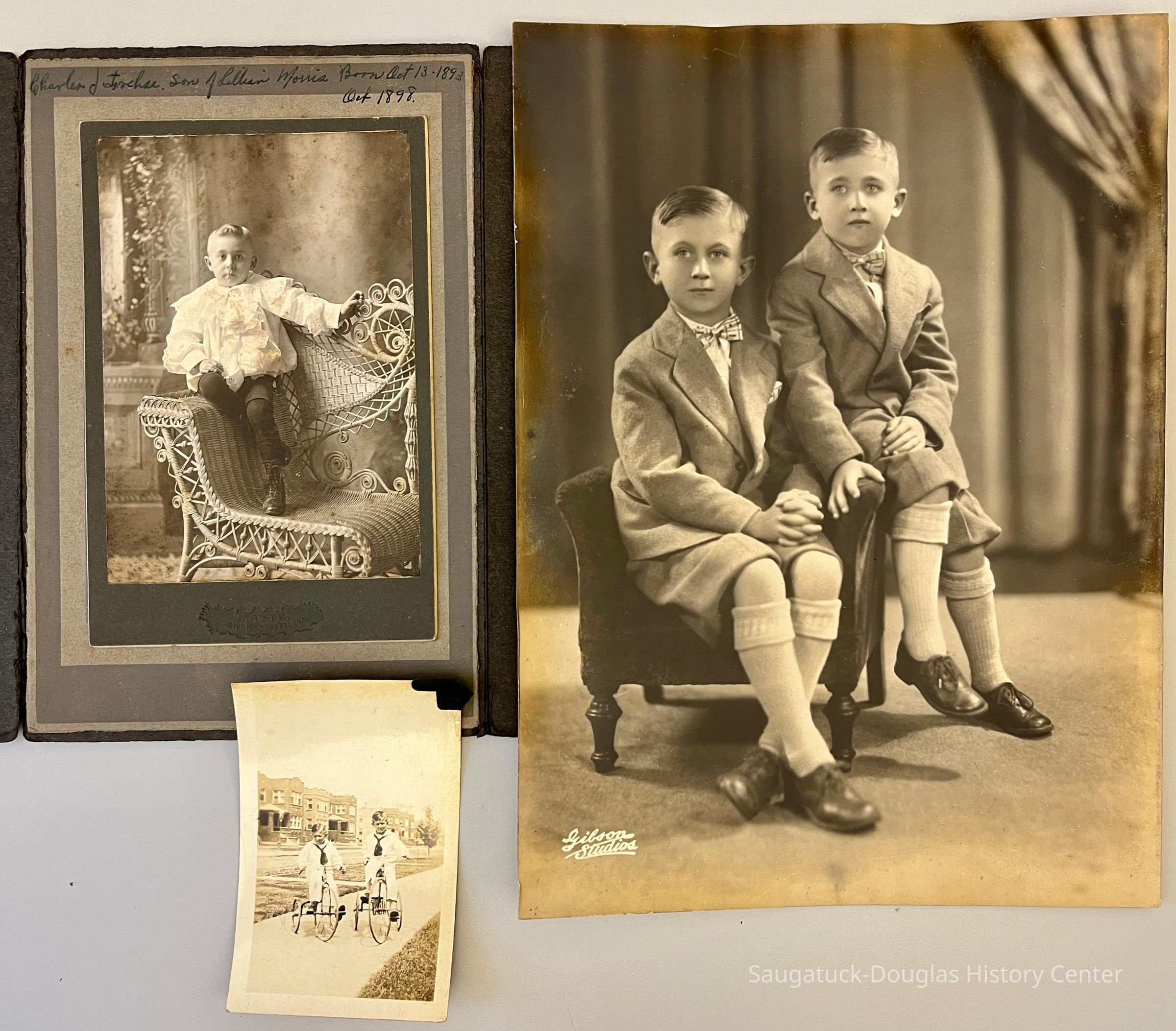          Charles as a frilly todder, brother on tricycles and dressed dapper for studio shot
   