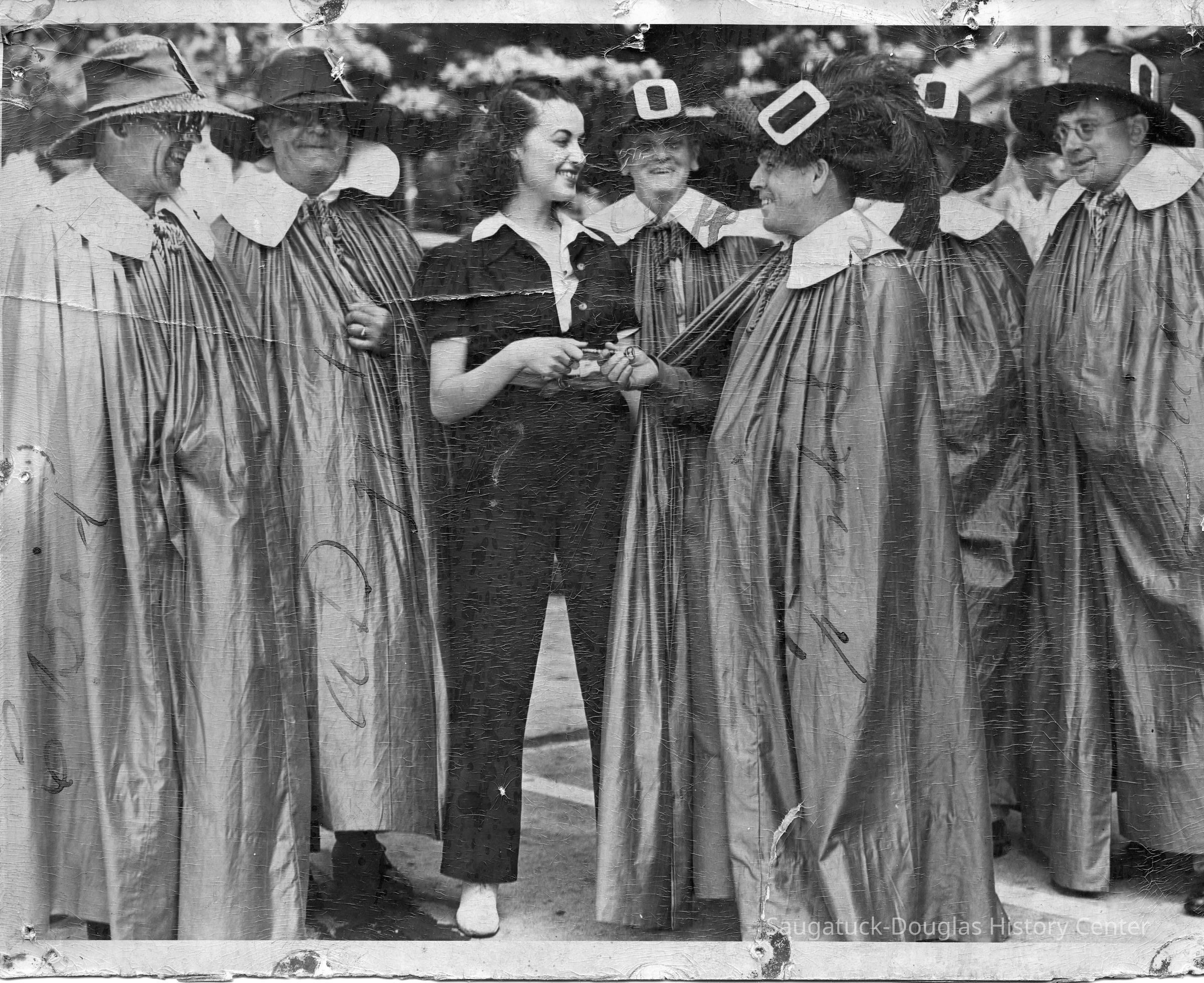          89-1-103 A harbor or oval Day.jpg 1.5MB; MISS MARY ELLEN ARSENAU of Champaign, Ill., above, a connoisseur of art, Wednesday was given the key to the city of Saugatuck, with the approval of the city council, as the annual Arts fete opened. At the presentation, left to right, were: COUNCILMEN CARY BIRD, ED FORCE, MISS ARSENAU, COUNCILMAN DICK NEWHAM, MAYOR FRANK SEWERS, who presented the key, and COUNCILMEN FRANK WICKS AND RALPH CLAPP.
   