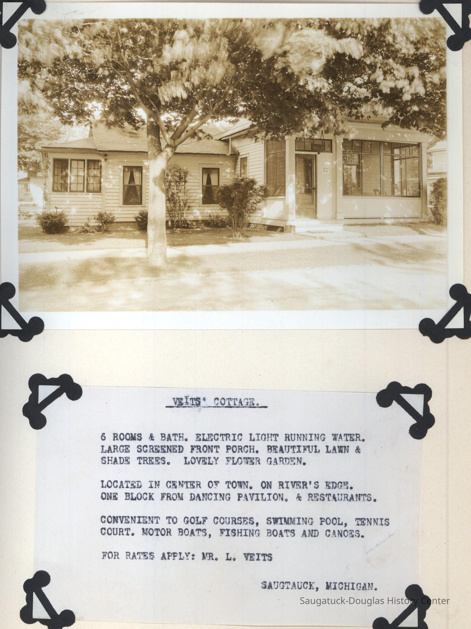 Veits Cottage on Water Street with a sign that read