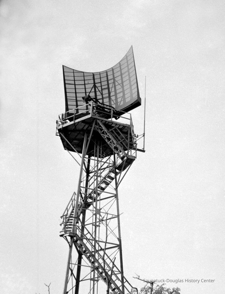 This image was featured as History Mystery #42 with the solution: Part of the Cold War air defense system, this radar sweep fit nicely inside the ball on top of Mt. Baldhead.