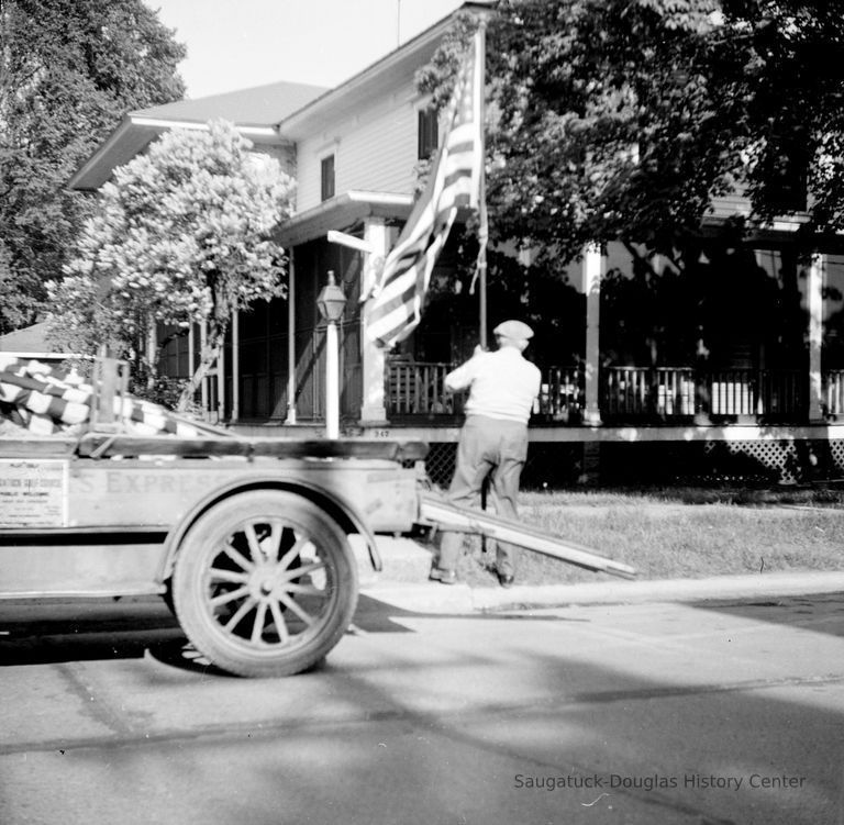          Frank Wicks setting up flags picture number 1
   