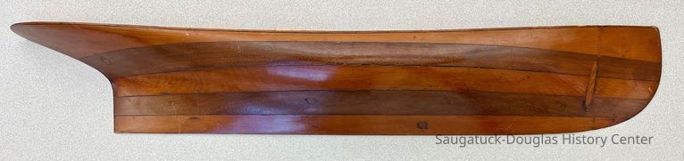          Front; A half model of the tug John Gordon used by Martel during construction.
   