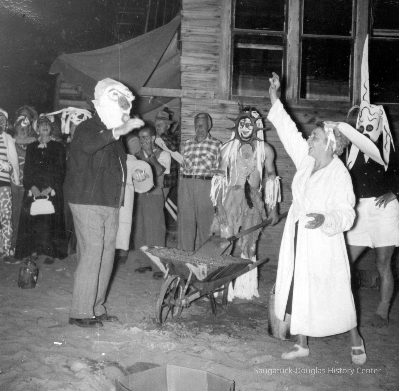          Burial ceremony 3.jpeg 922KB; Cement ready to pour. Elsa Ulbricht at right in white robe
   