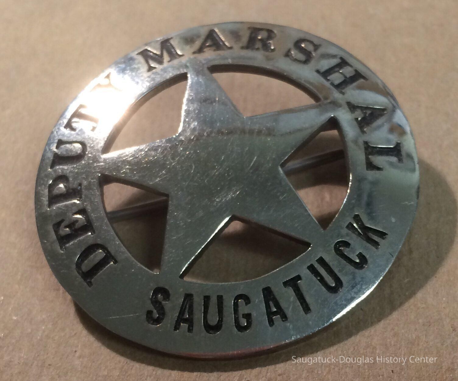          marshal badge
   