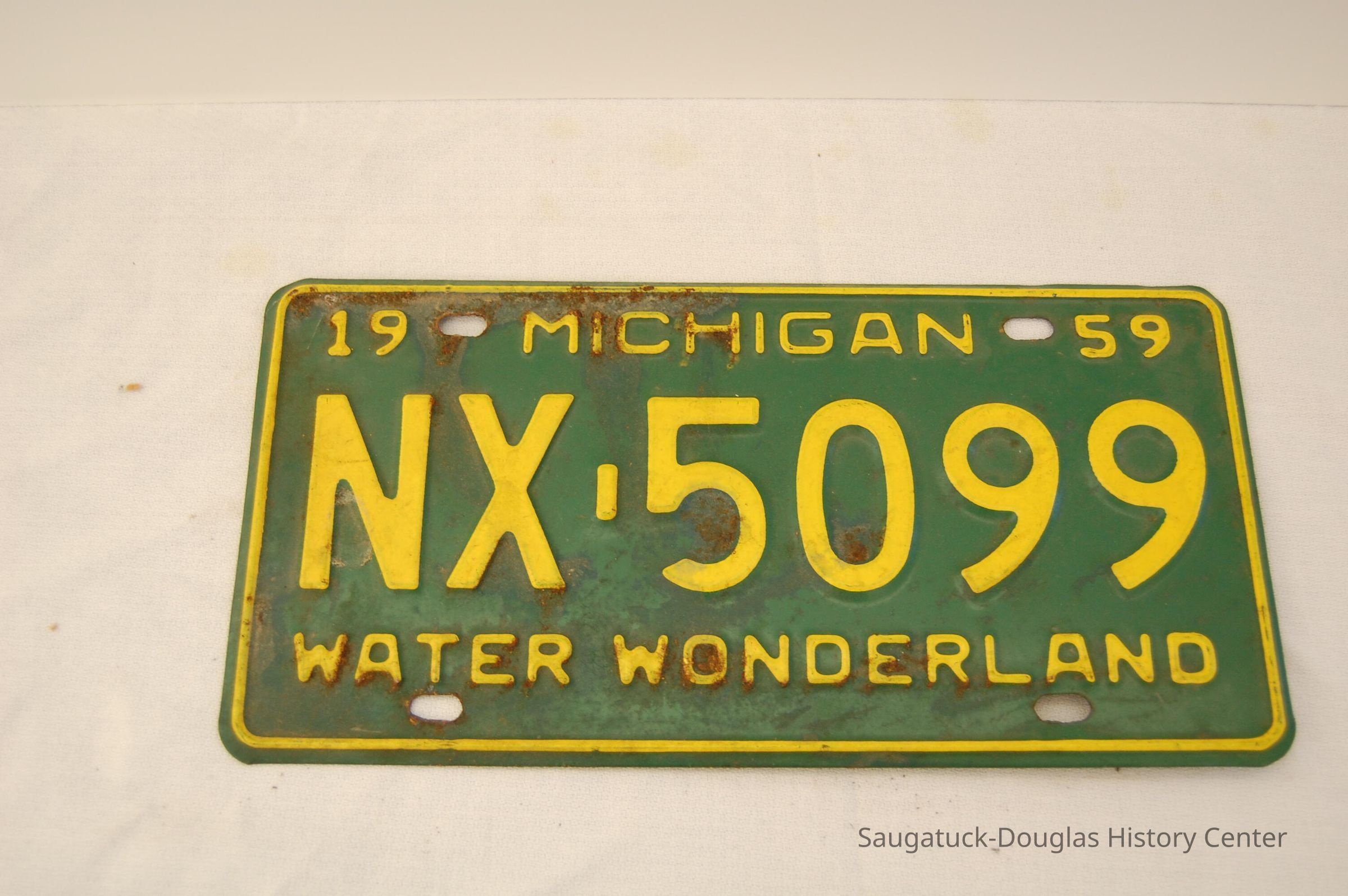license plate; Origsize: 13 1/2 x 25