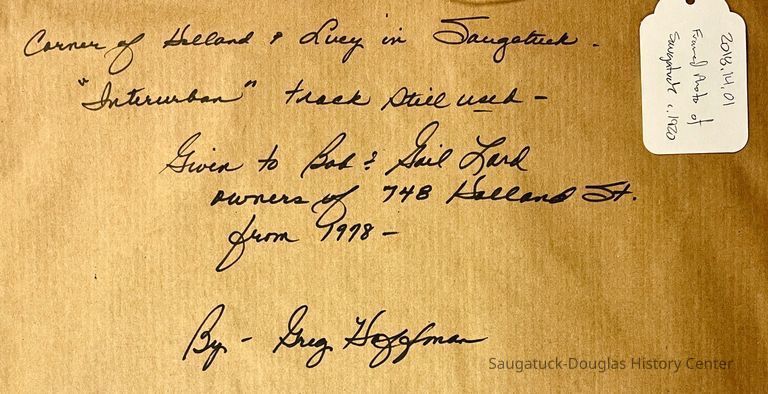 Corner of Holland and Lucy in Saugatuck, "Interurban" track still used -- Given to Bob & Gail Lord owners of 748 Holland St. from 1978 -- by Greg Hoffman.