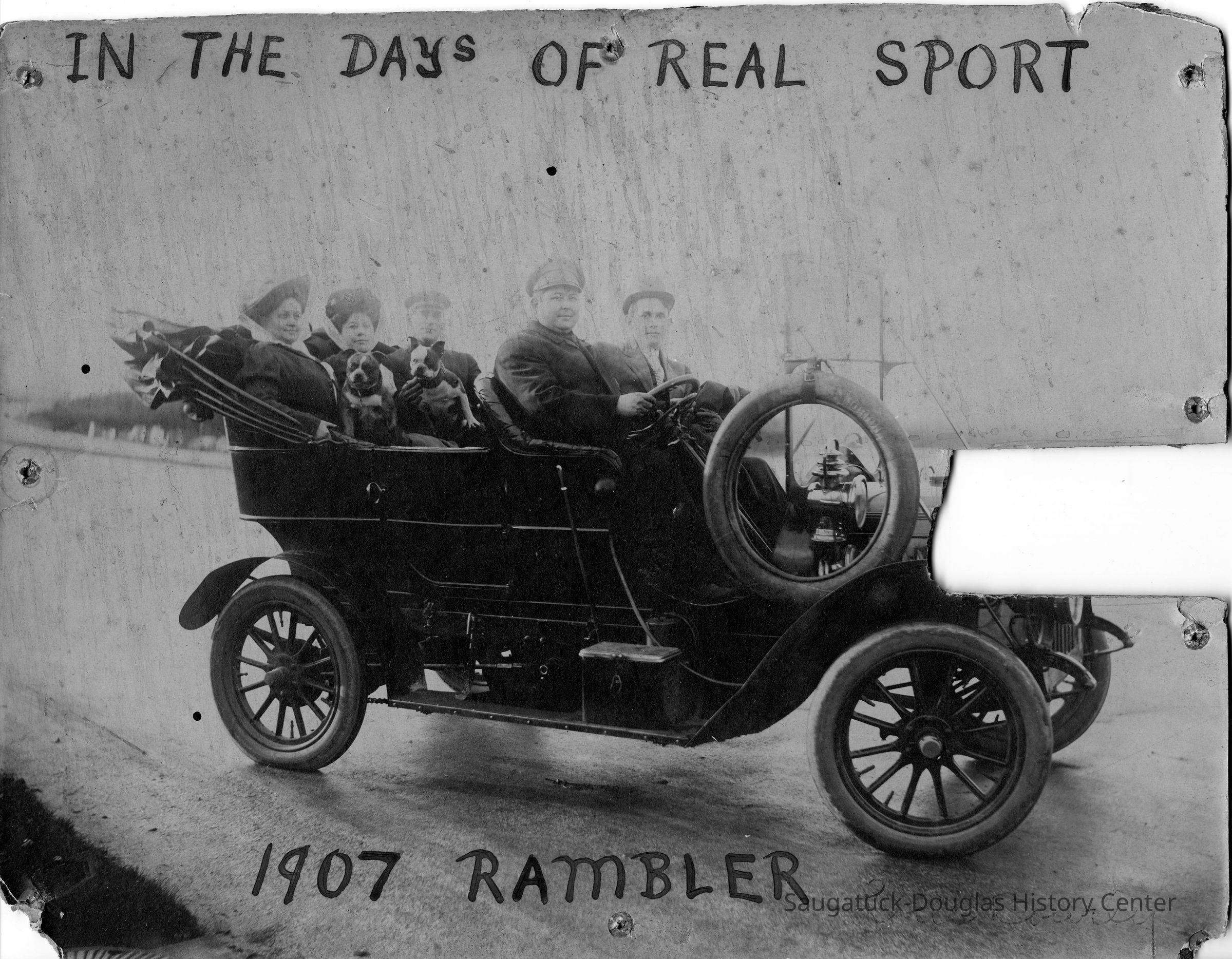          89-1-192_1907_Rambler.jpg 1.5MB; In the days of real sport 1907 Rambler - Sporty photo of five adults and two dogs our for a spin in a newfangled automobile.
   