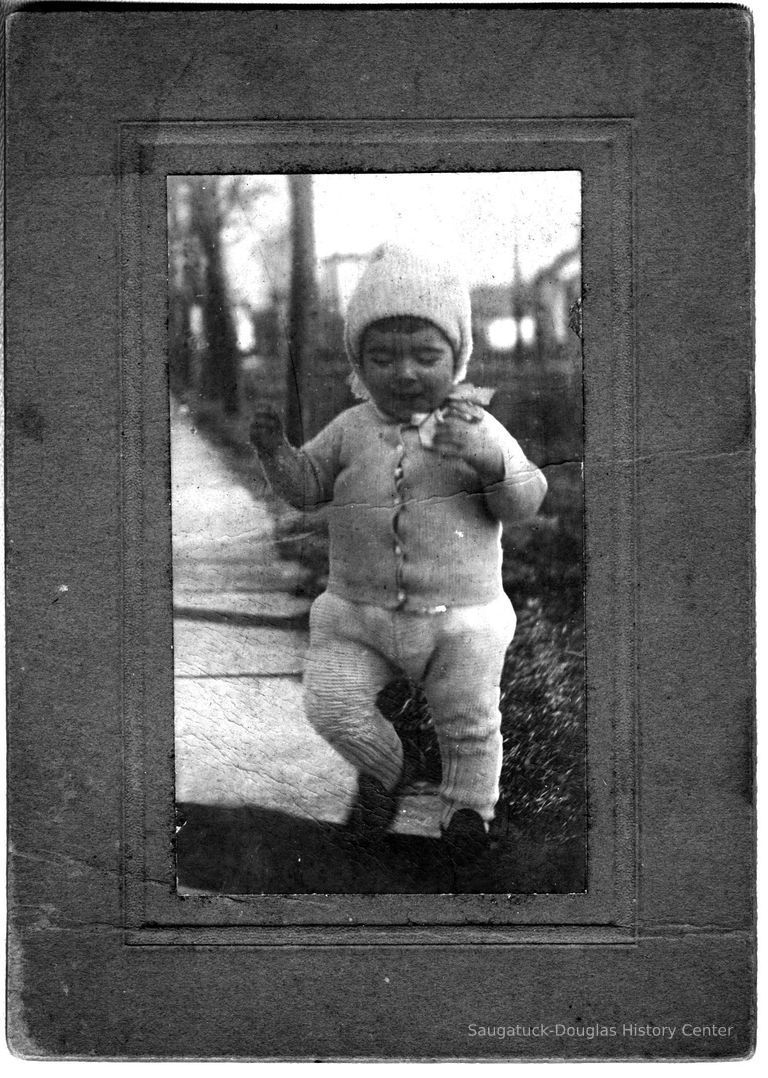          89-1-37 Margaret D. Brown.jpg 679KB; Margaret D. Brown as a toddler bundled up in knitted clothing as she walks outside
   