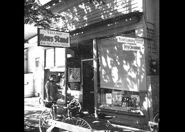          HM93 Village News Stand.jpg 1.5MB; Digital file on Jack Sheridan Drive 2021.72.02
   