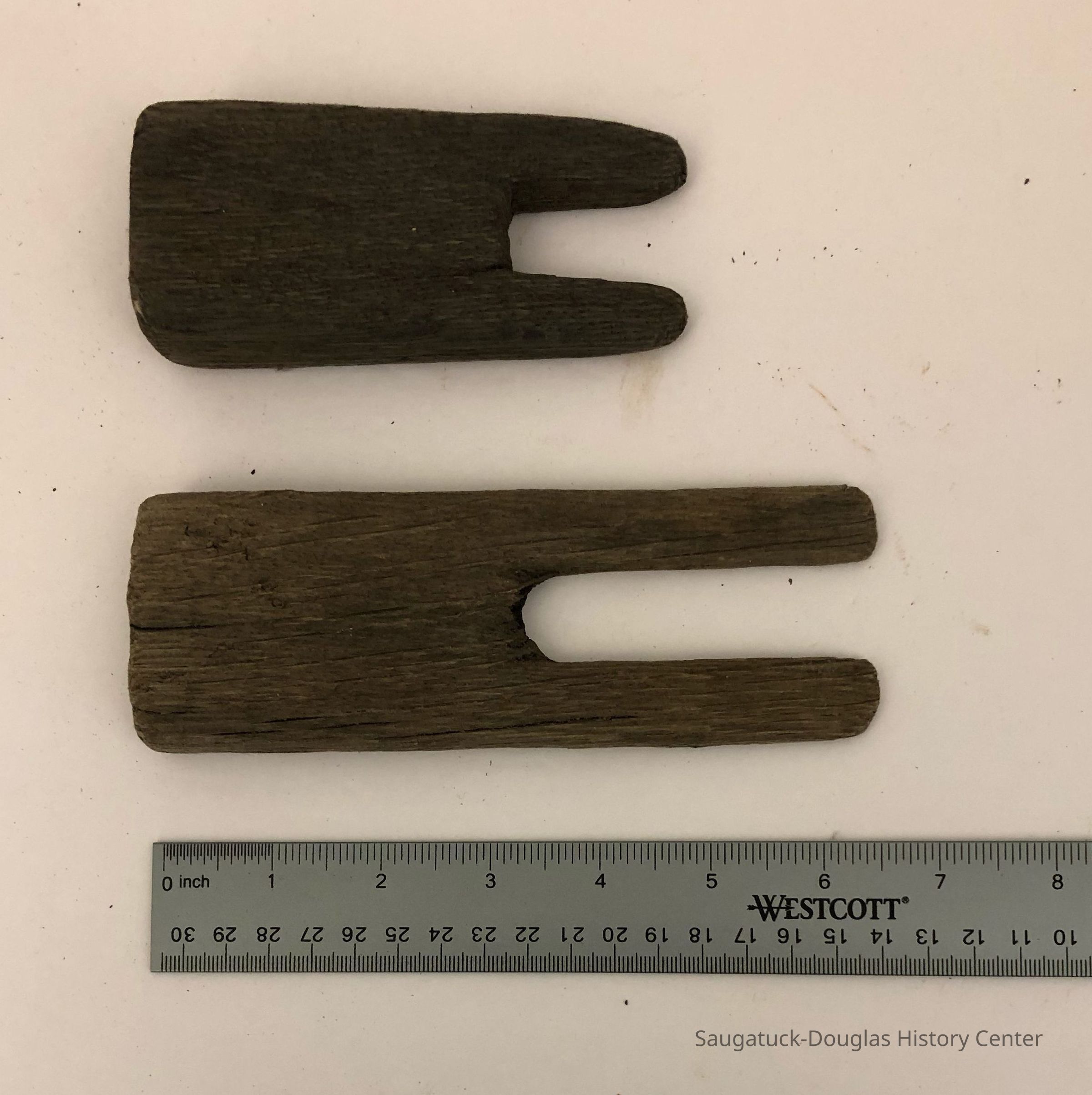Rafting pins; Two 6 inch by 2.5 inch hand carved crotched wooden logging pins