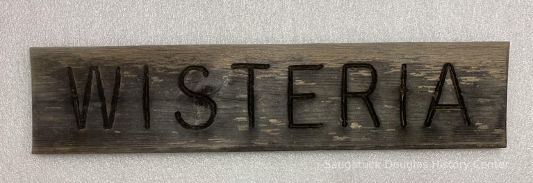         Wisteria wooden sign from Camp Gray Cottage
   