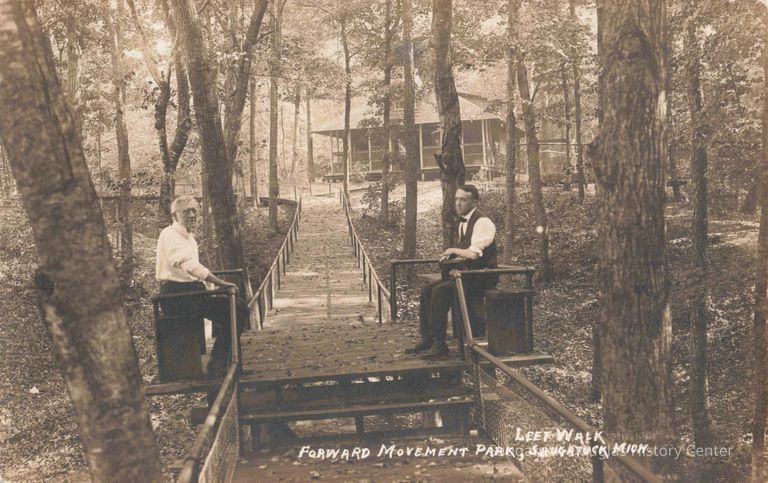 Source: "Leet Walk Forward Movement Park, Saugatuck Mich.". https://quod.lib.umich.edu/t/tinder/x-1498/tinder-rppc-002995. In the digital collection David V. Tinder Collection of Michigan Photography. William L. Clements Library, University of Michigan Library Digital Collections. February 01, 2026.