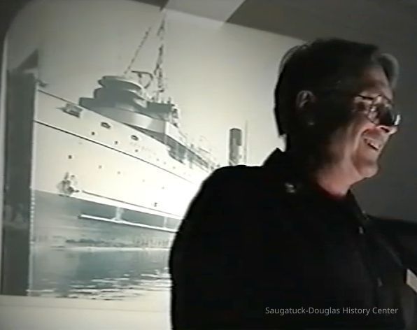          The S.S. Keewatin steamship behind presenter Bob Zimmerman, 2003
   