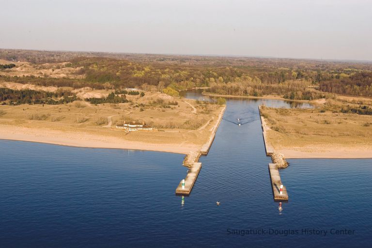          Ken Denison mansion, Kalamazoo River Mouth channel, piers and turning basin.
   