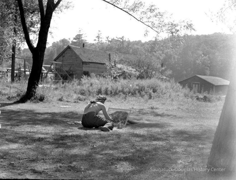 Artists painting in town