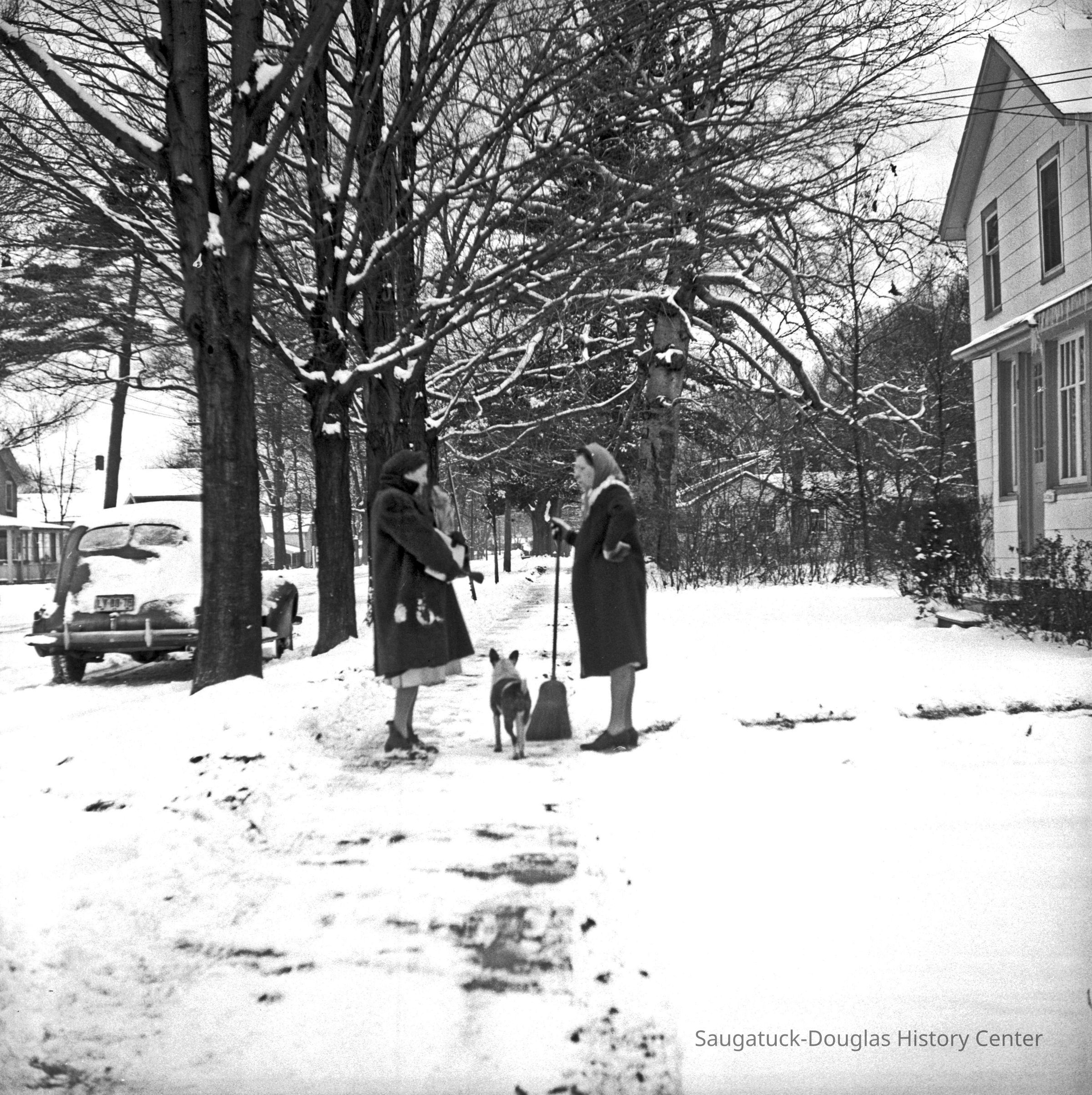 a668 gossip lake st.jpg 4.5MB; 668 0/1 Saugatuck - People 12/12/1945 “Gossip” 2 women, 2 dogs on Butler Street, in front of Ralph Clapp's house