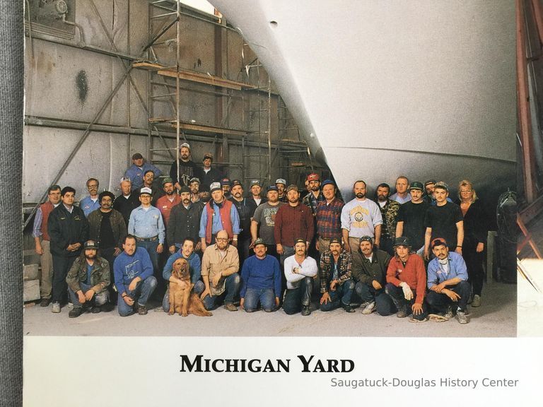          close up of back cover depicting workers from the Saugatuck yard
   