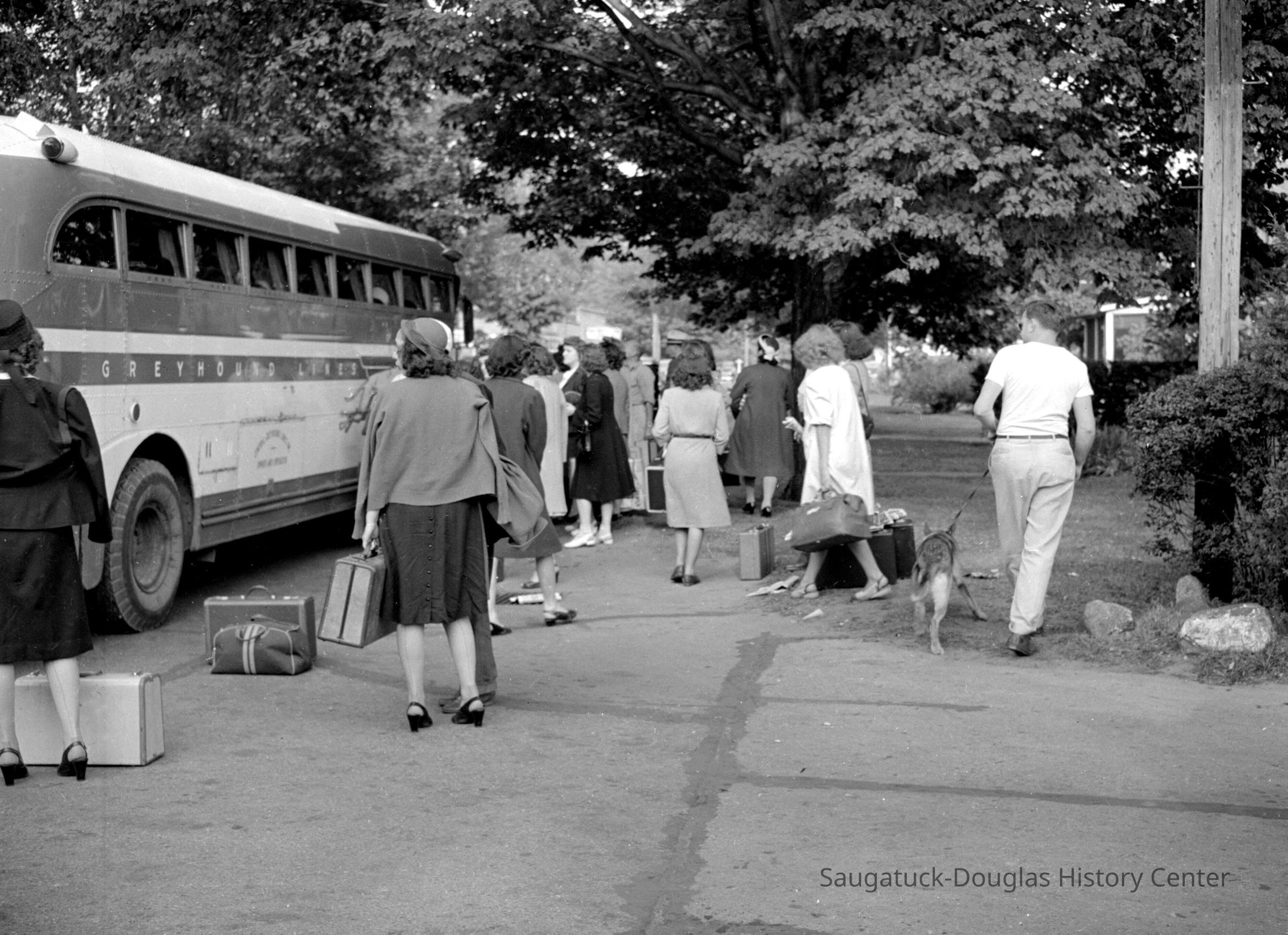          730; According to Kirk White, the bussing leaving after Labor Day was the saddest day of the year. The buses loaded in front of Funk's news stand (Tabor Hill).
   