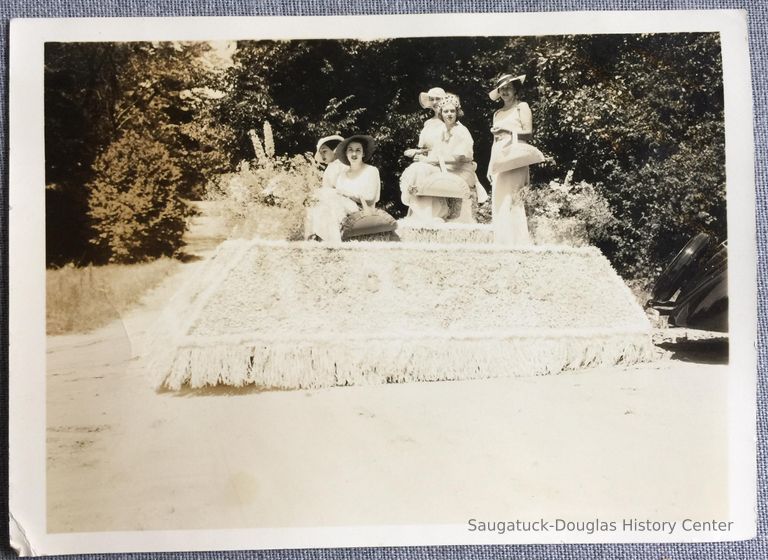          Five women posed on a parade float picture number 1
   