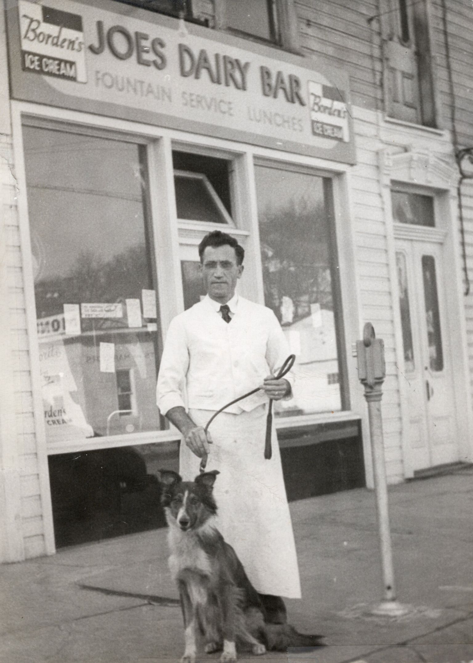 Joseph C. Russo [1900-1990] standing in front Joe's Dairy Bar