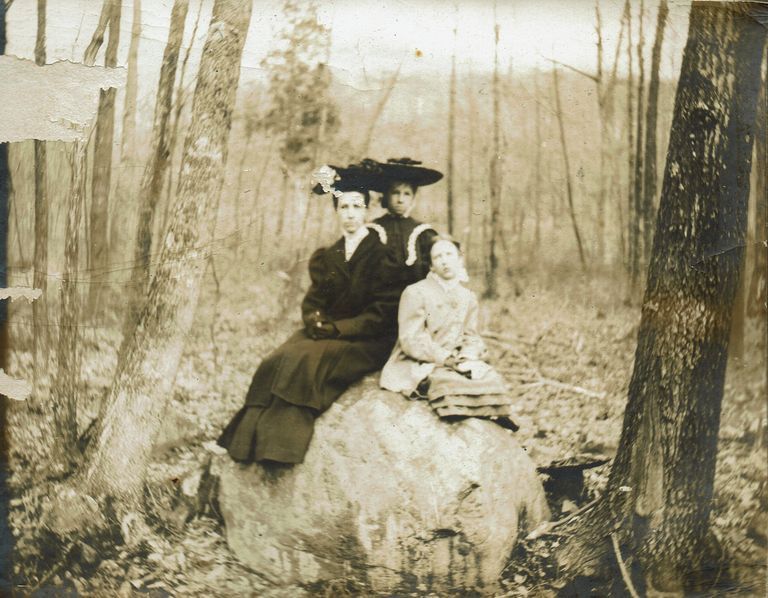          Marshall-Schmidt Photo Album: Margaret Marshall and two other females seated on a rock picture number 1
   