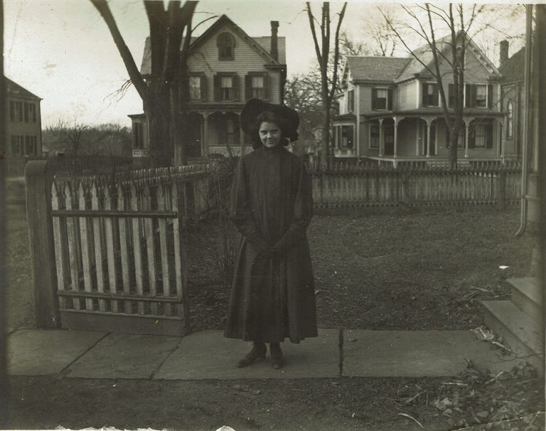         Marshall-Schmidt Album: Ada Marshall-Schmidt Standing on Sidewalk in front of houses picture number 1
   