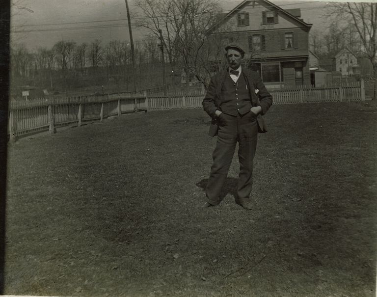          Marshall-Schmidt Album: Frank Marshall Standing in Yard picture number 1
   