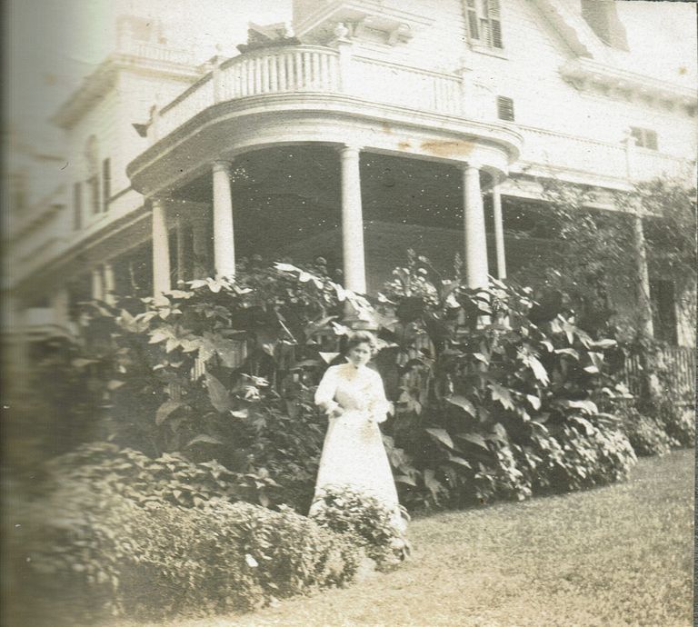          Marshall-Schmidt Album: Female Standing Outside House picture number 1
   